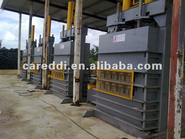 Waste tire baler