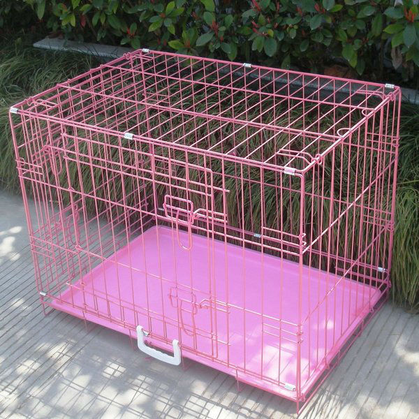 small pink dog crate